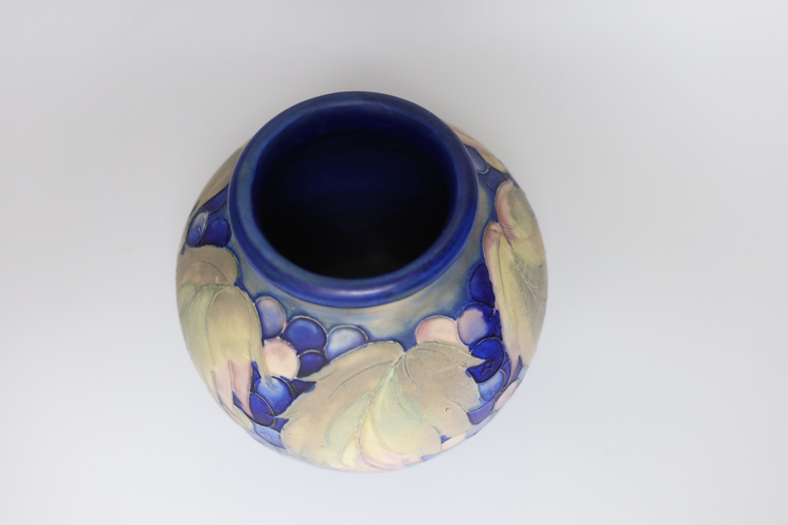 A Moorcroft salt glaze 'Leaf and Berries' vase, 16cm